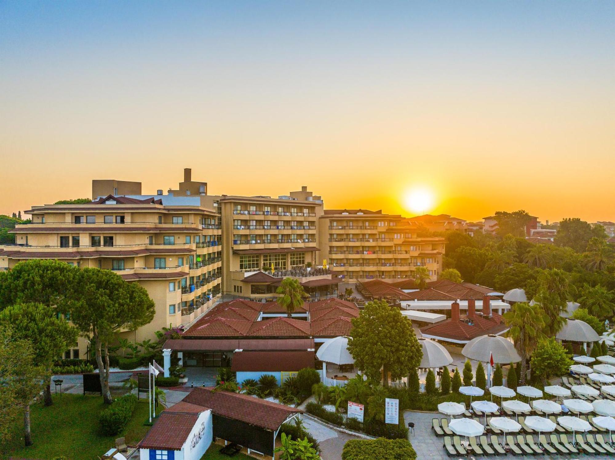 Asteria Family Resort Belek アンタルヤ エクステリア 写真 Sunset at the hotel